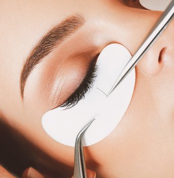 Woman getting a natural-looking beauty revamp with best eyelash extensions