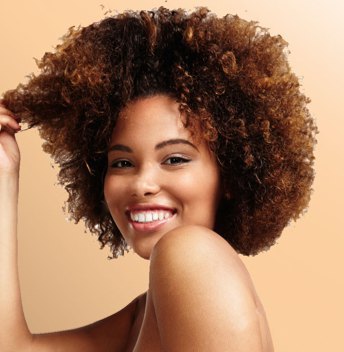 Woman looking trendy after coming out of professional sew-in weave salon